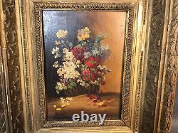 Ancien tableau huile sur bois bouquet de fleurs dans cadre en bois et plâtre