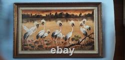 Tableau ancien à l'huile signé représentant un paysage avec des grues sauvages