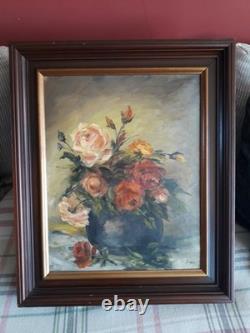 Tableau ancien à l'huile sur toile représentant un bouquet de roses