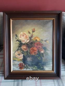 Tableau ancien à l'huile sur toile représentant un bouquet de roses